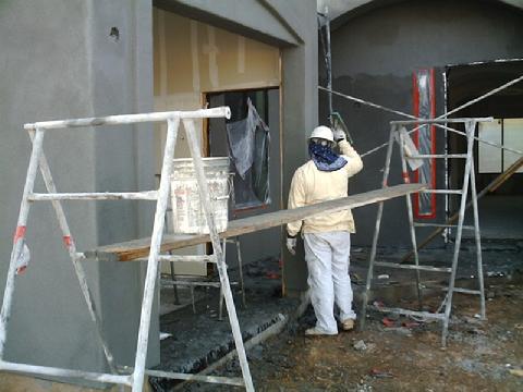 Man Working on a Stucco Wall